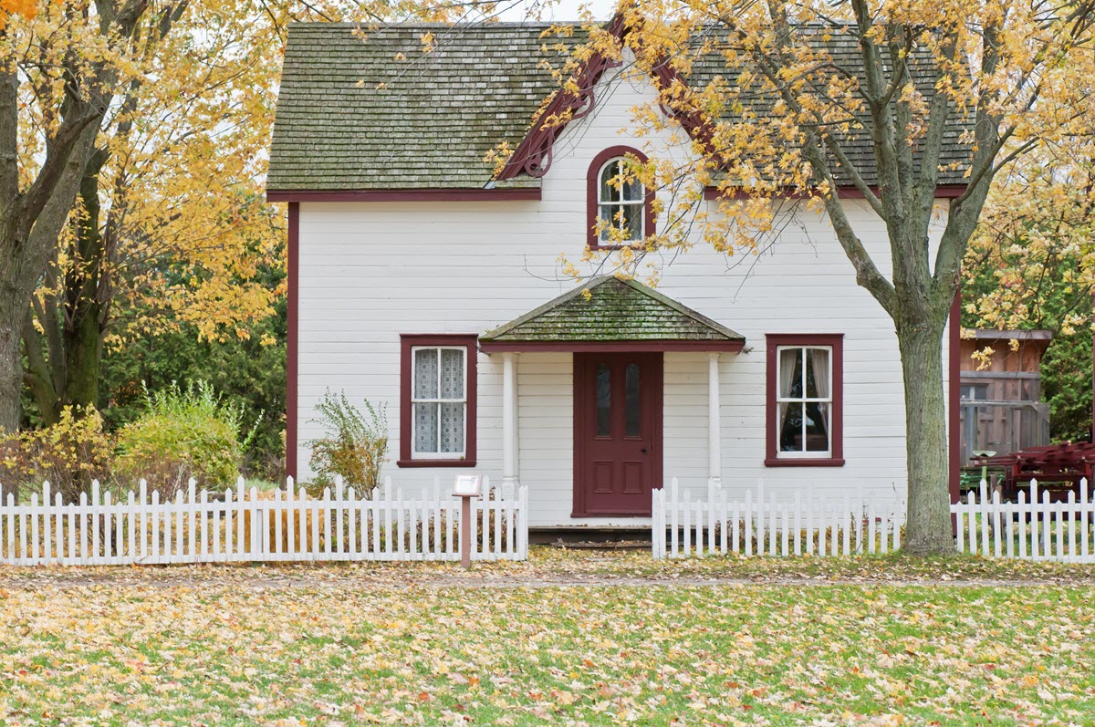 House with fall leaves